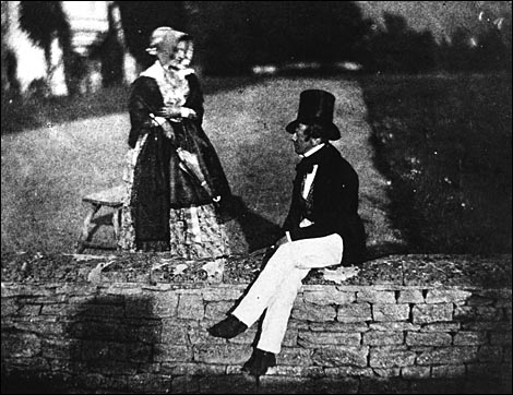 Talbot, Man and woman sitting on garden wall in Lacock Abbey, 1835